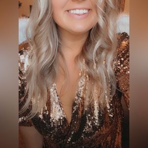 Gold sequins dress. Wings not included.